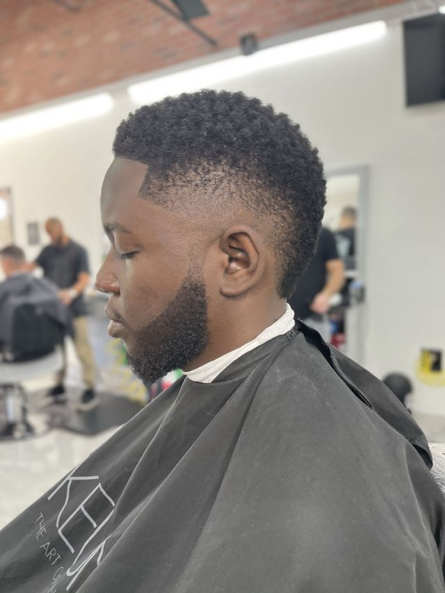 Curly taper fade with sharp line up