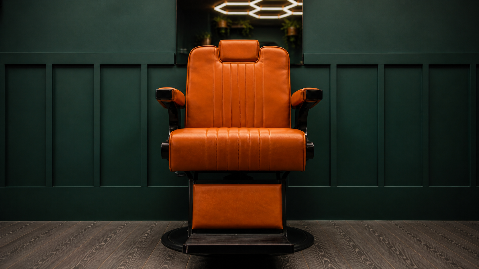 Barber chair facing the mirror station at JM Barber Co.